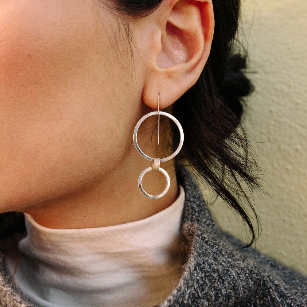 
                      
                        EAR Sequence Earrings
                      
                    