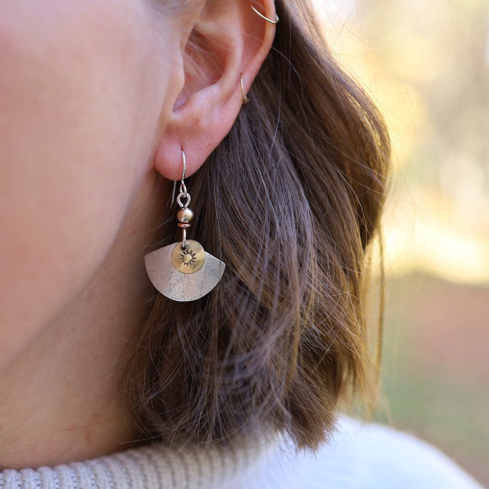 
                      
                        EAR Silver Fan With Brass Disc Earring
                      
                    