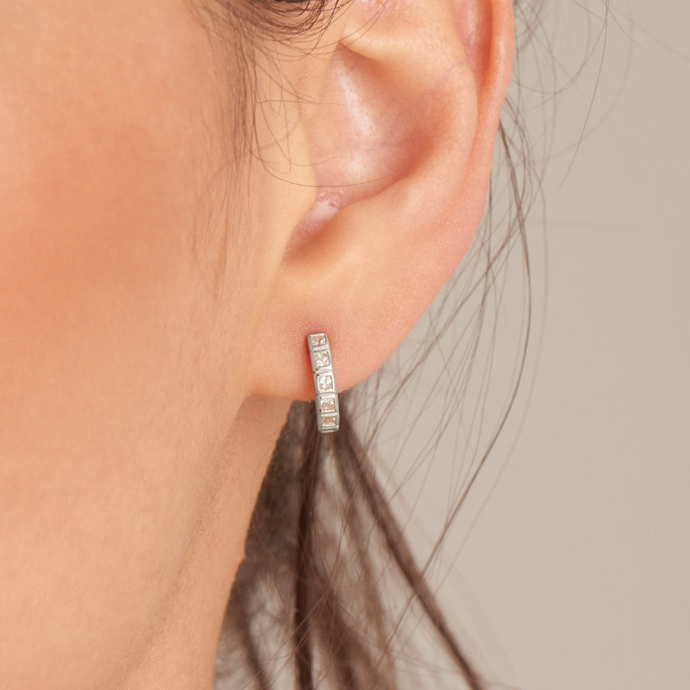 
                      
                        EAR Silver Glam Huggie Hoop Earrings
                      
                    