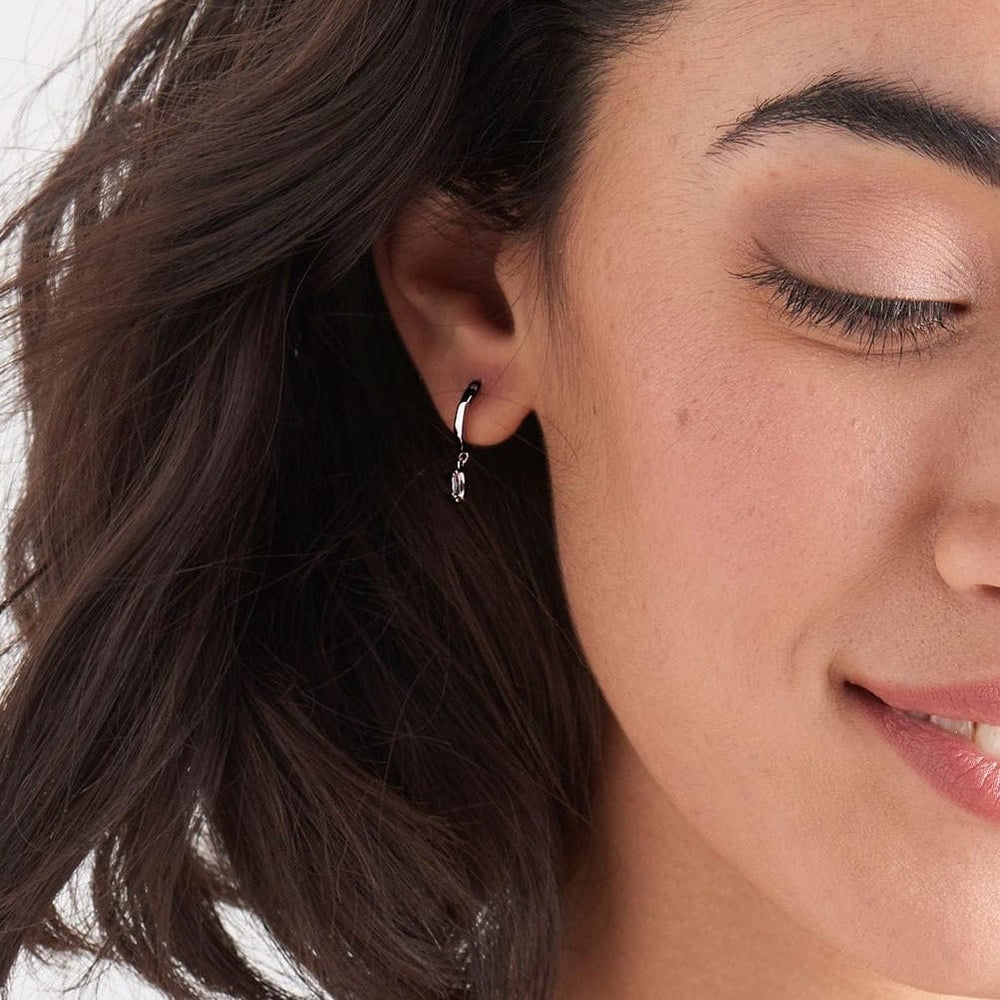 
                      
                        EAR Silver Glow Huggie Hoops
                      
                    