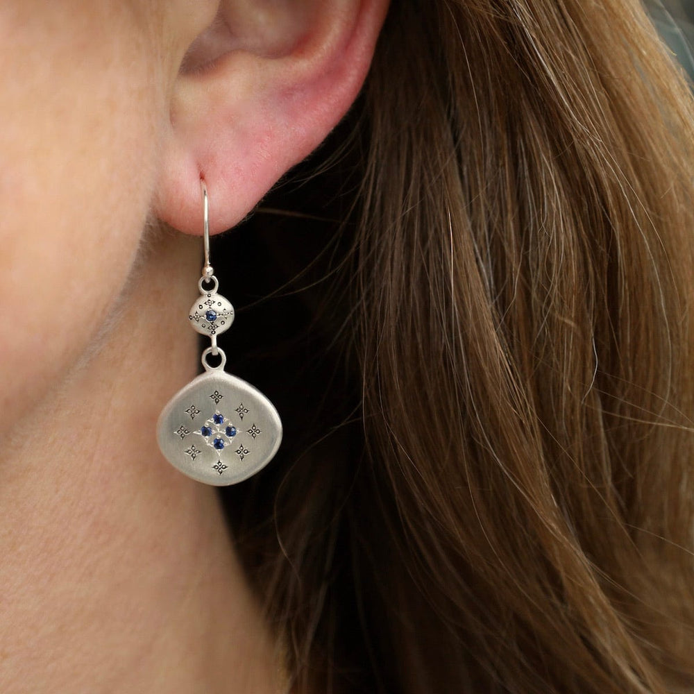 
                      
                        EAR Silver Lights Earrings with Charms in Blue Sapphire
                      
                    