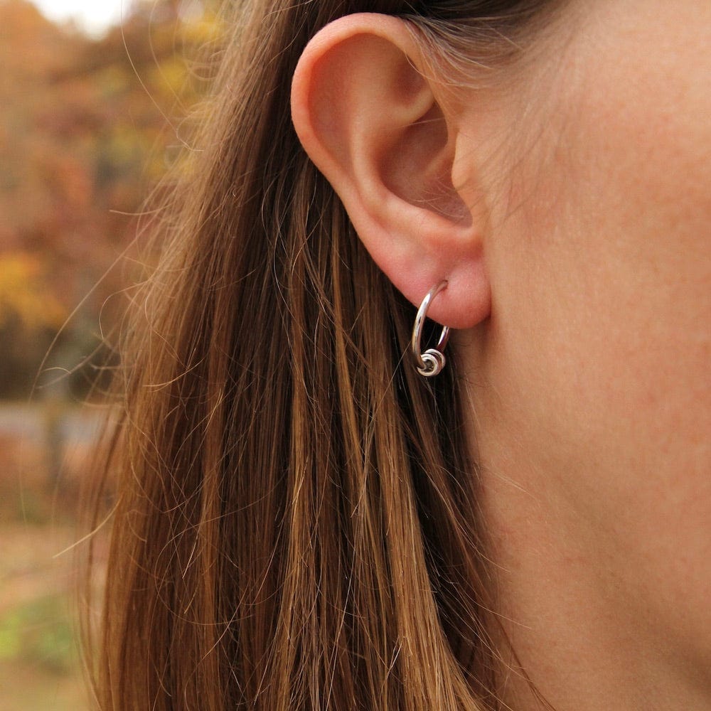 
                      
                        EAR Silver Modern Hoop Earrings
                      
                    