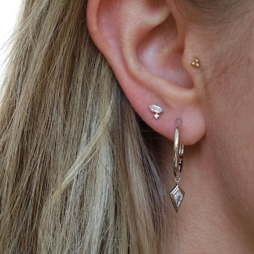 
                      
                        EAR Silver Sparkle Emblem Stud Earrings
                      
                    