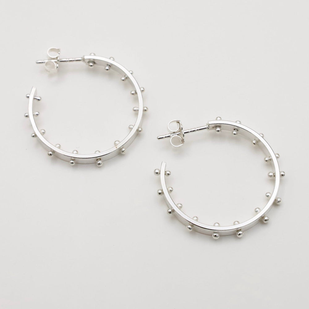 
                  
                    EAR Small Ball Hoops in Polished Silver
                  
                