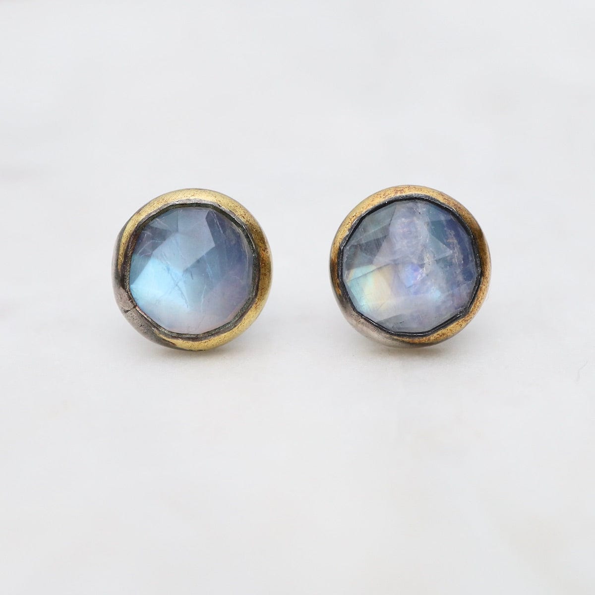 https://dandelionjewelry.com/cdn/shop/files/ear-small-crescent-rim-post-earrings-with-moonstone-41179301019879.jpg?v=1697563428