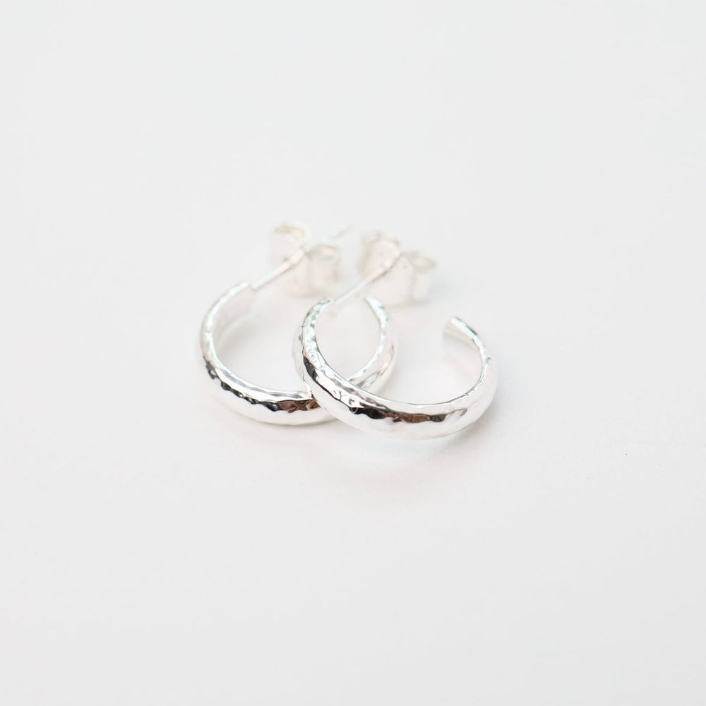 
                  
                    EAR Small Finely Hammered Hoops in Sterling Silver
                  
                