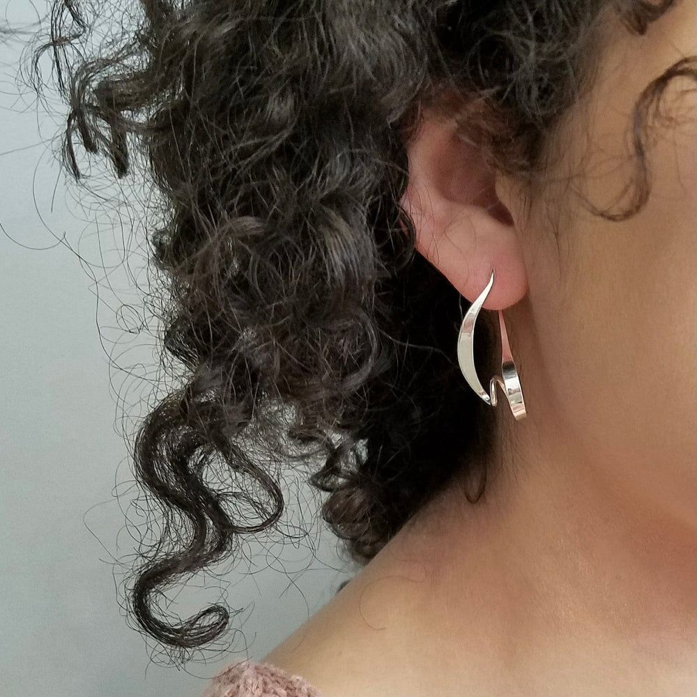 
                      
                        EAR Small Kinetic Earrings
                      
                    