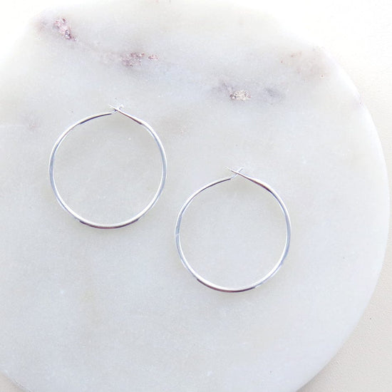 Load image into Gallery viewer, EAR SMALL STERLING SILVER HOOP
