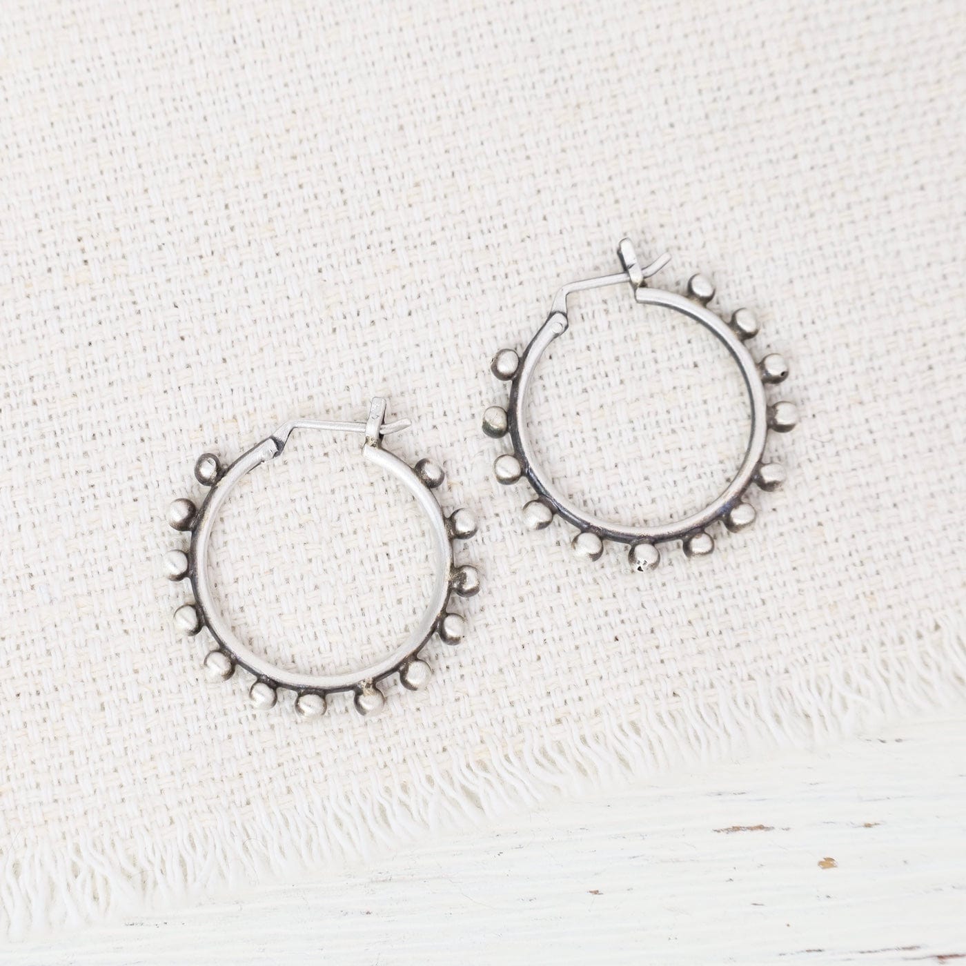 EAR Spaced Graulated Hoop In Sterling Silver