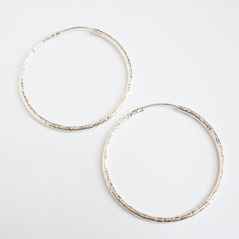 
                      
                        EAR Sterling Silver 52mm Textured Hoop
                      
                    