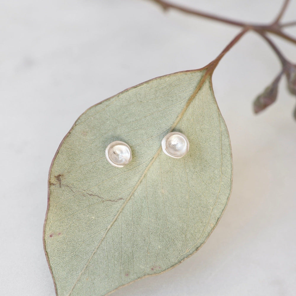 
                  
                    EAR Sterling Silver Baby Mussel Shell Studs
                  
                