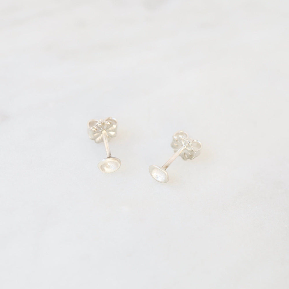 
                  
                    EAR Sterling Silver Baby Mussel Shell Studs
                  
                