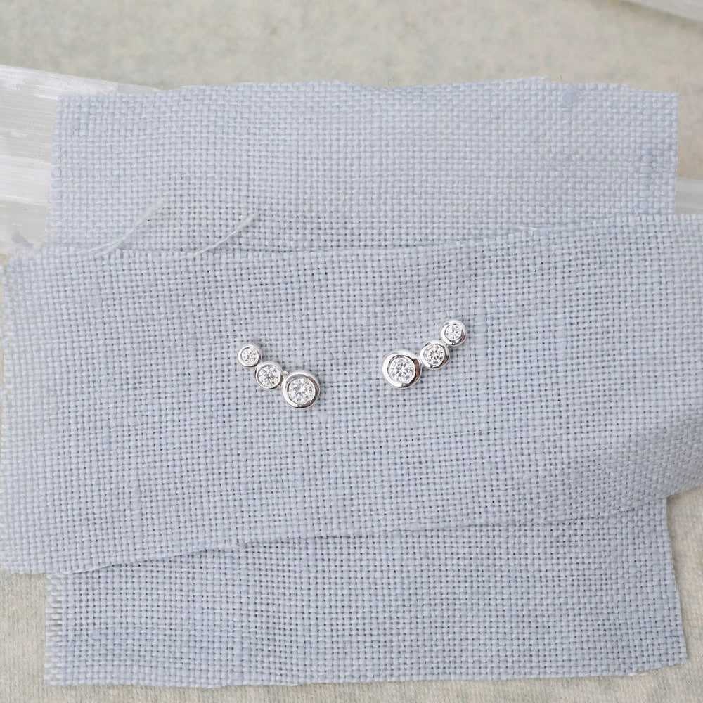 
                      
                        EAR Sterling Silver CZ Small Curved Studs
                      
                    