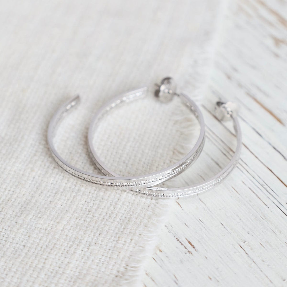 
                  
                    EAR Sterling Silver Extra Large Symphonic Hoops
                  
                