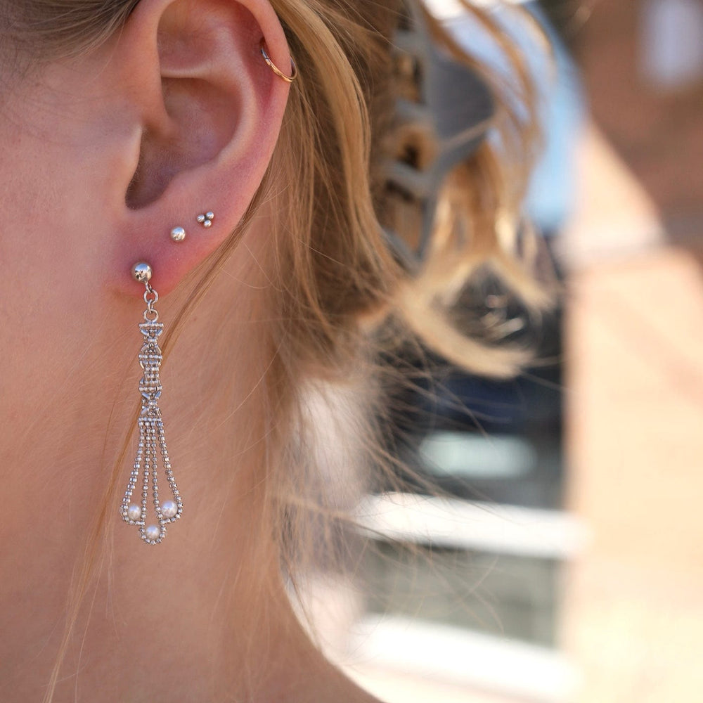 
                      
                        EAR Sterling Silver Helix with 3 Pearl Earrings
                      
                    