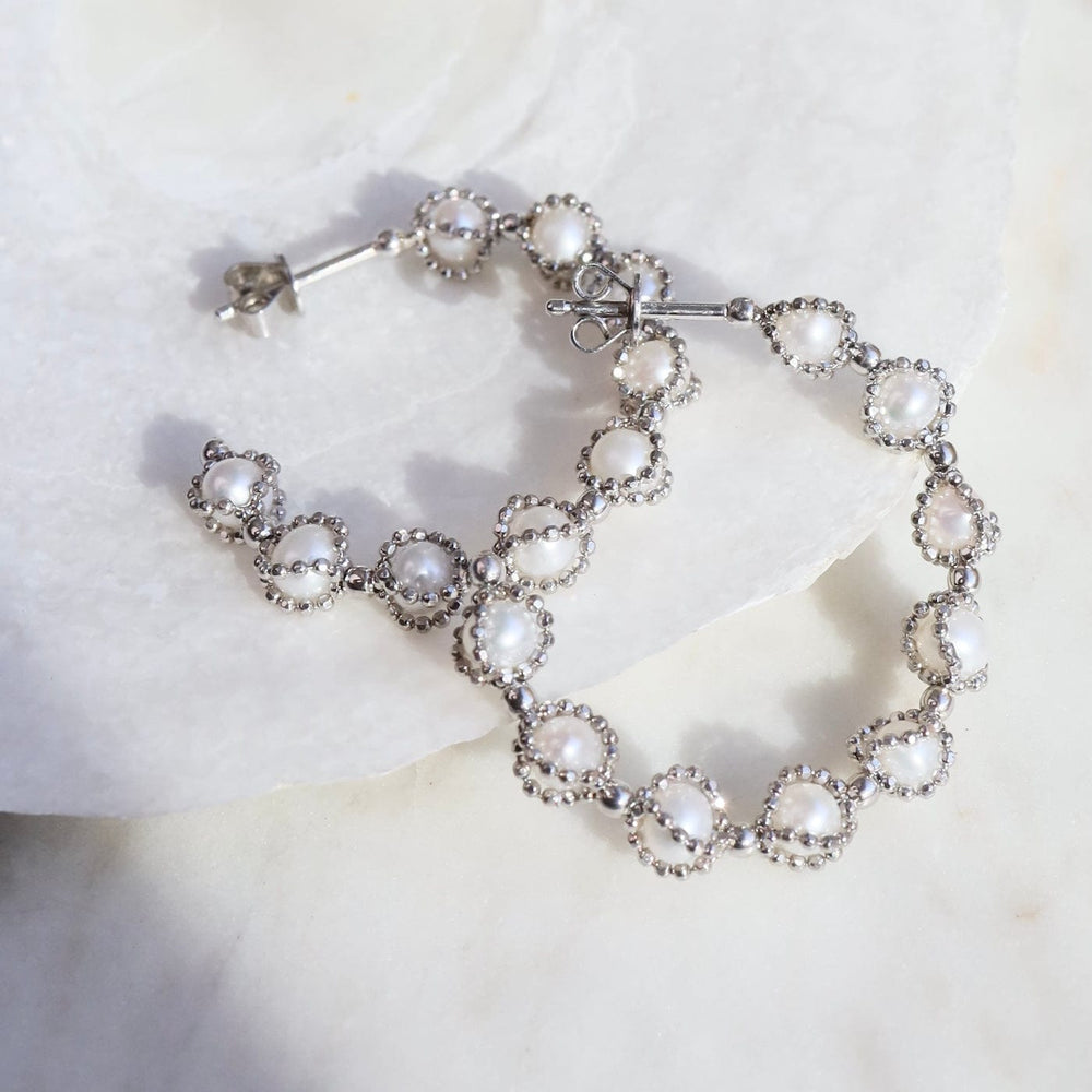 
                      
                        EAR Sterling Silver Hoops with Captured Pearls
                      
                    