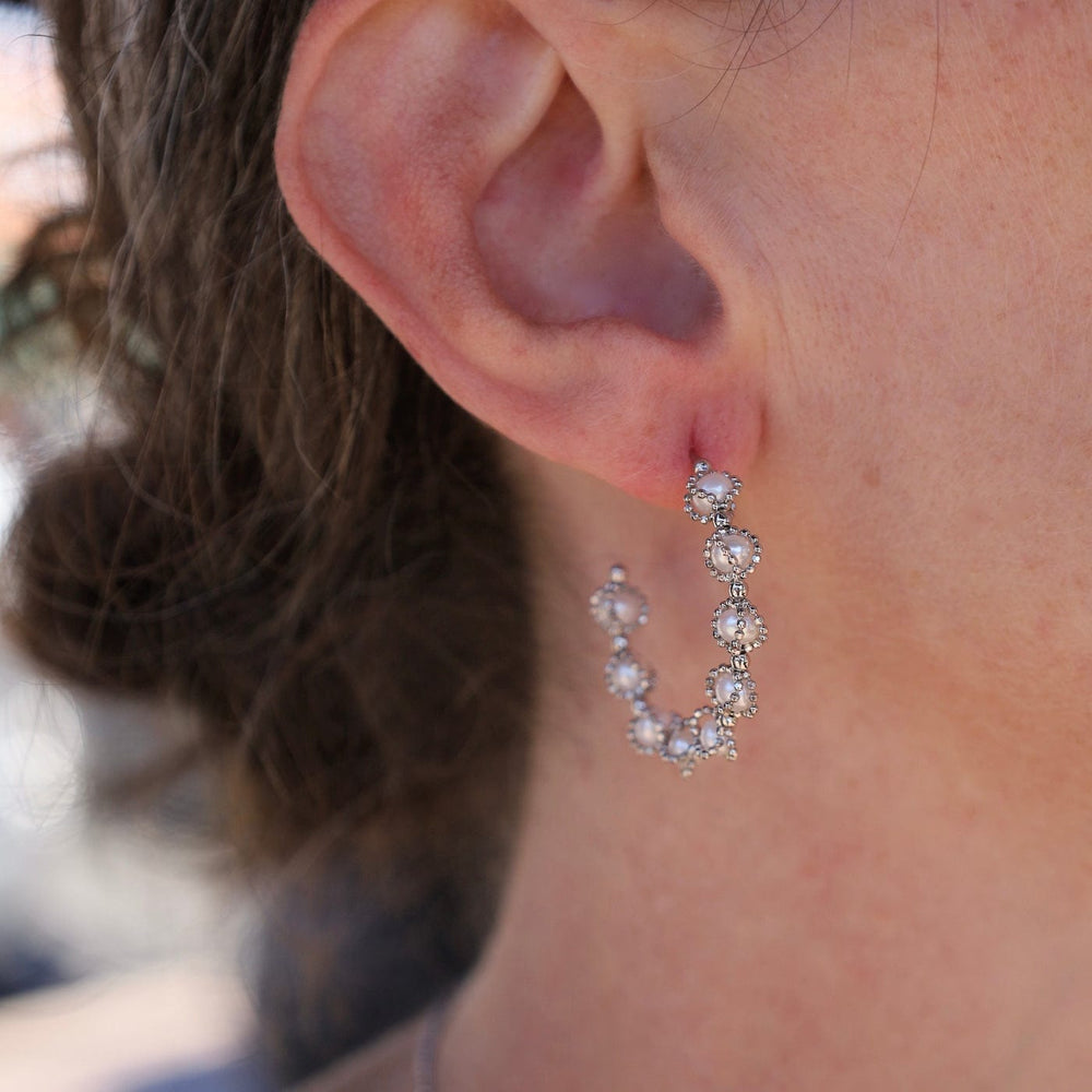 
                      
                        EAR Sterling Silver Hoops with Captured Pearls
                      
                    