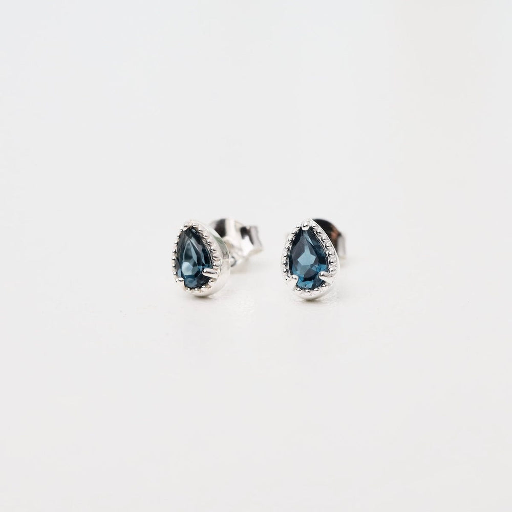 
                      
                        EAR Sterling Silver London Blue Topaz Milgrain Edge Pear Studs
                      
                    