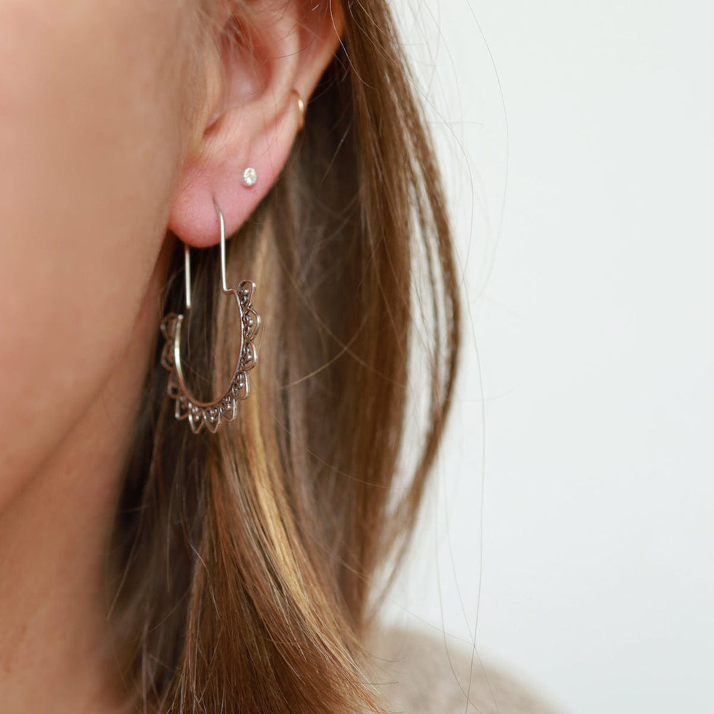 
                  
                    EAR Sterling Silver Lotus Drop Hoop
                  
                