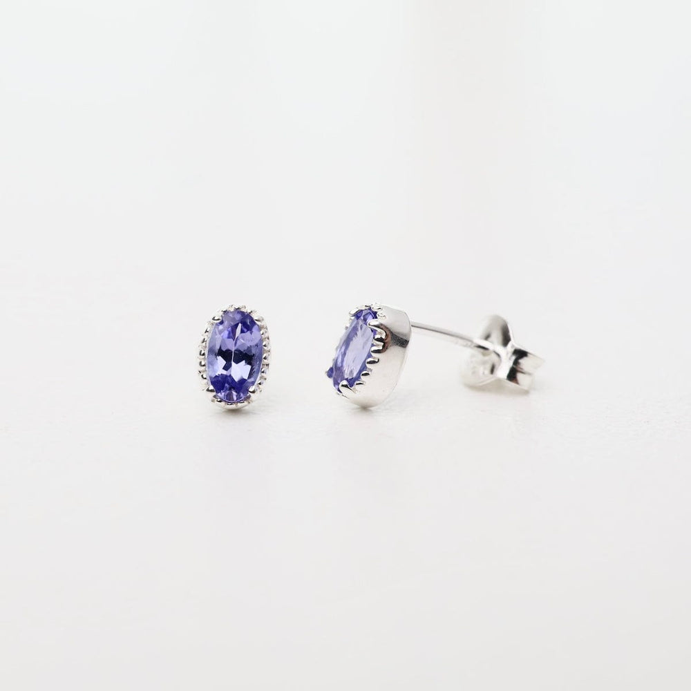 
                      
                        EAR Sterling Silver Oval Tanzanite with Milgrain Edge Stud Earrings
                      
                    