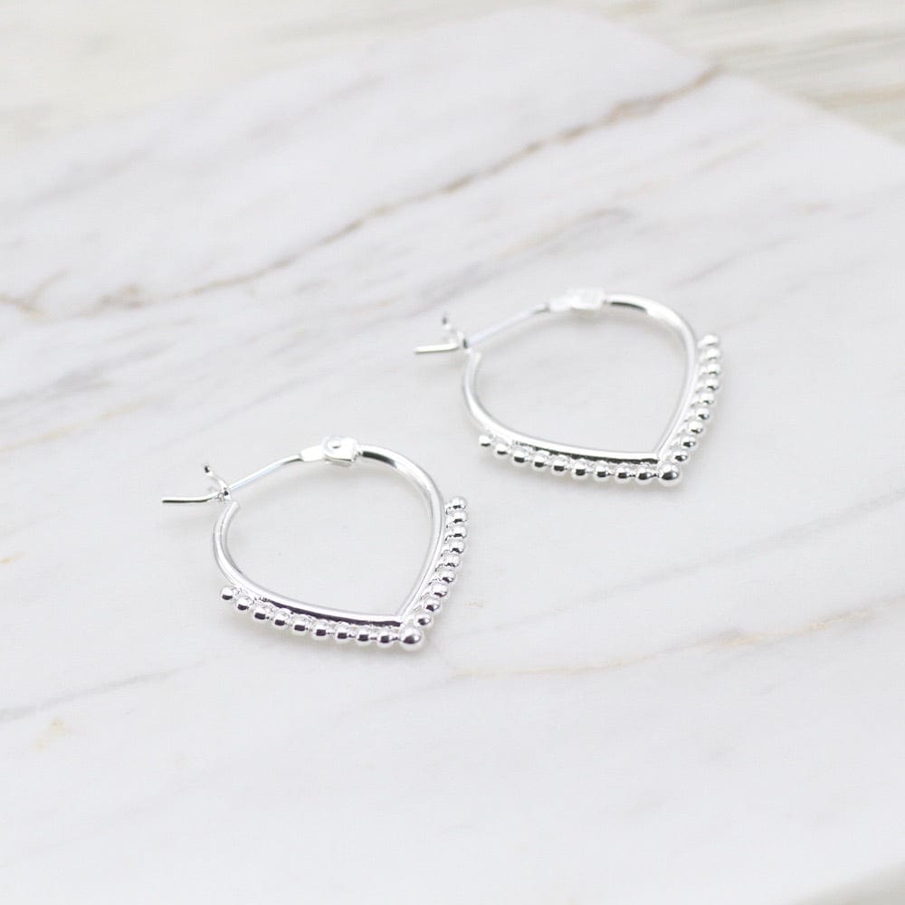 
                  
                    EAR Sterling Silver Petal Shaped Dotted Hoop
                  
                