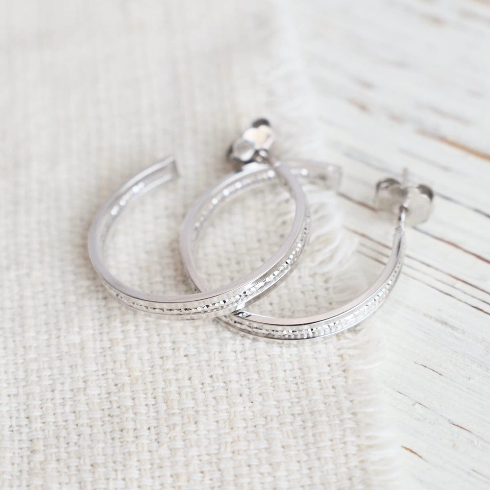 
                  
                    EAR Sterling Silver Symphonic Hoops
                  
                