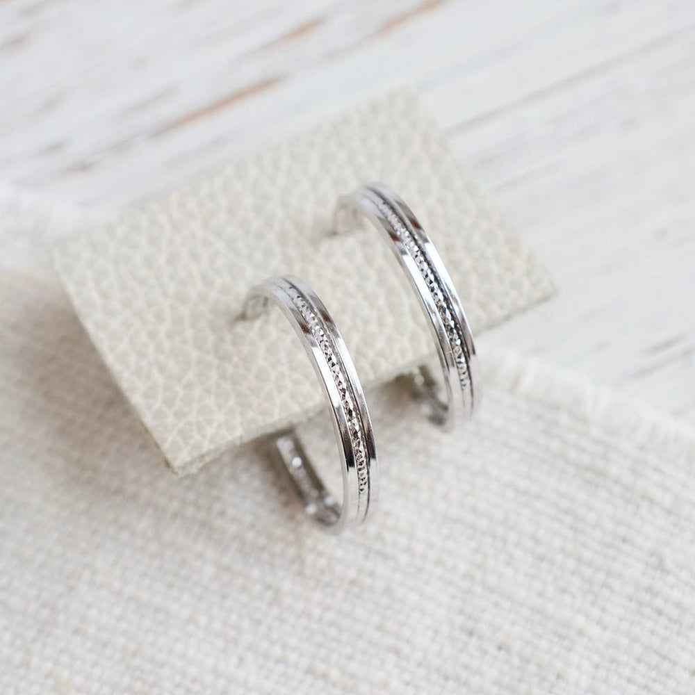 
                  
                    EAR Sterling Silver Symphonic Hoops
                  
                