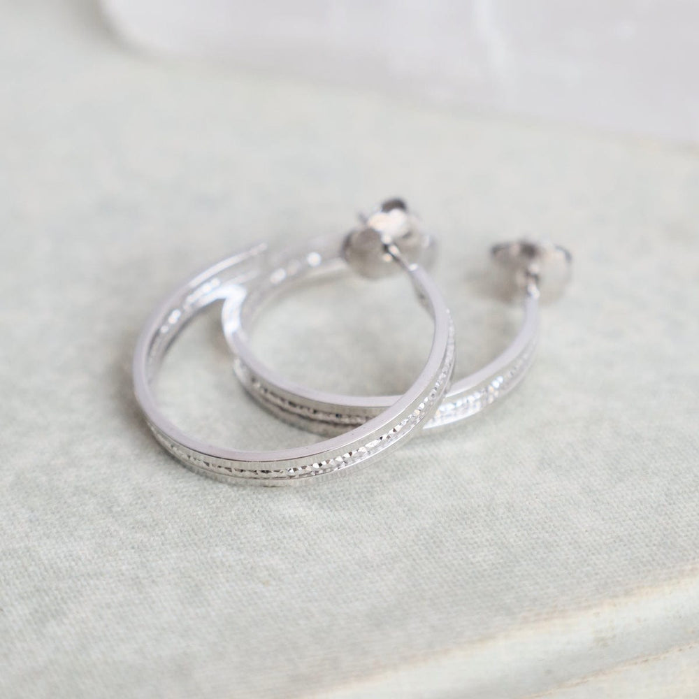 
                  
                    EAR Sterling Silver Symphonic Hoops
                  
                