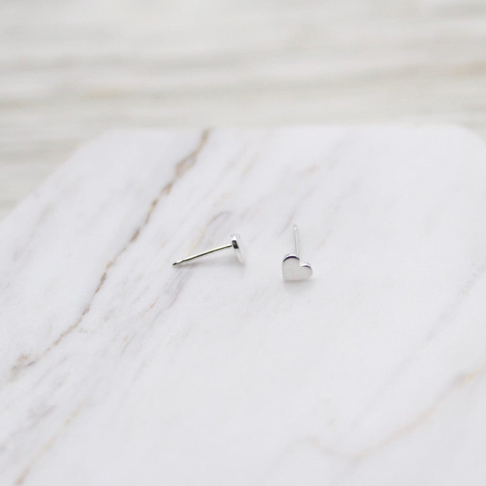 
                  
                    EAR Sterling Silver Tiny Heart Stud
                  
                