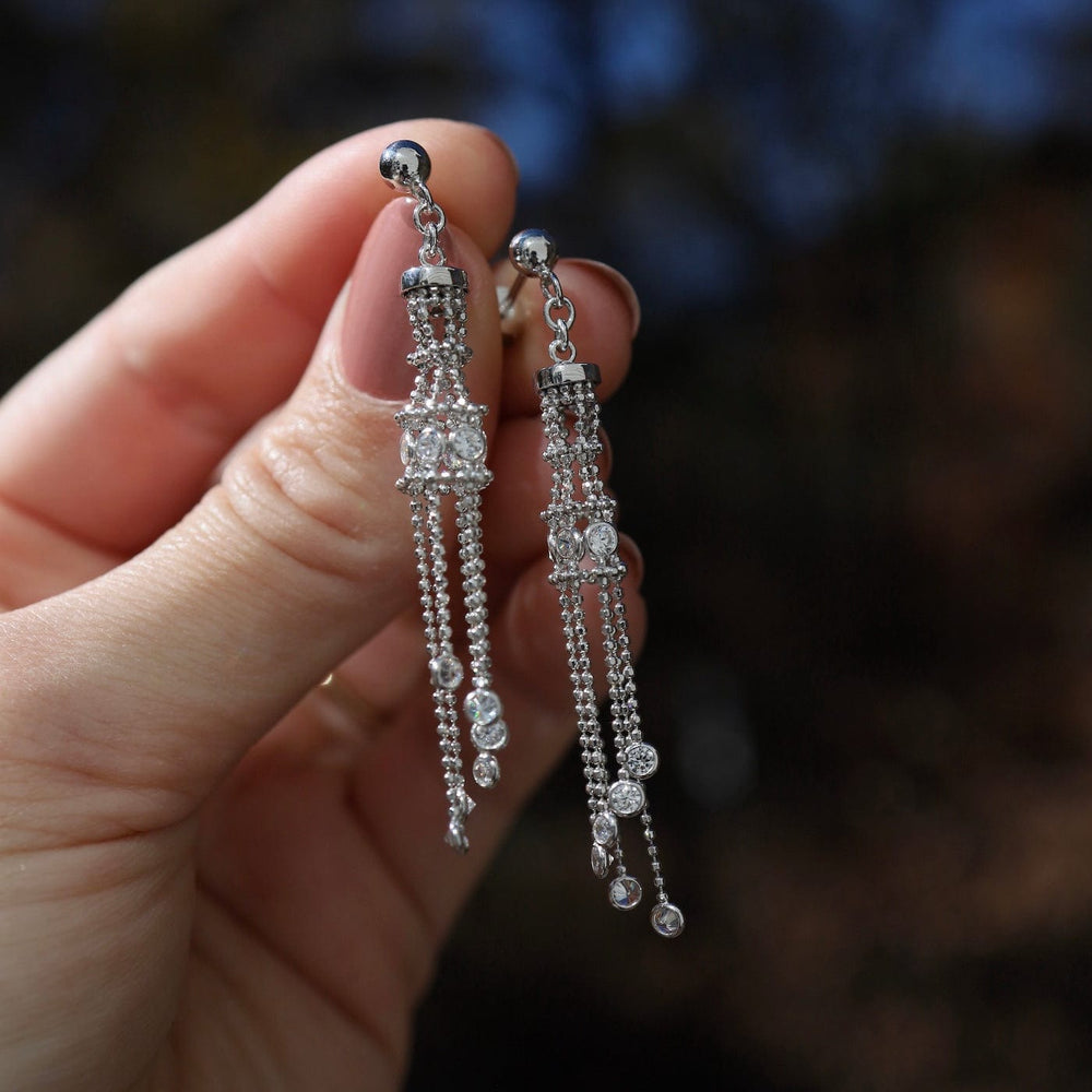 
                  
                    EAR Sterling Silver Woven Lace Long Lantern CZ Earrings
                  
                