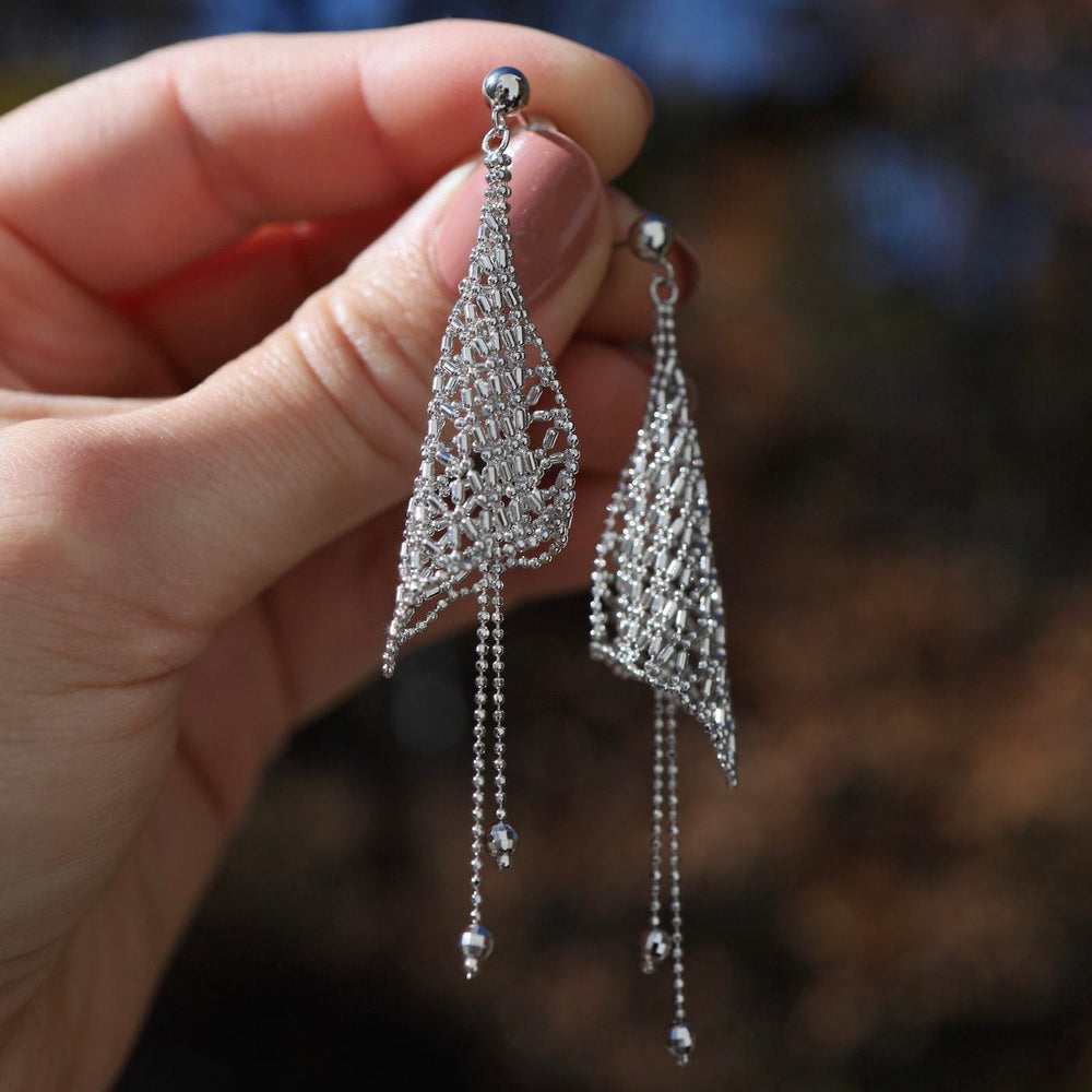 
                  
                    EAR Sterling Silver Woven Lace Trumpet Earrings
                  
                