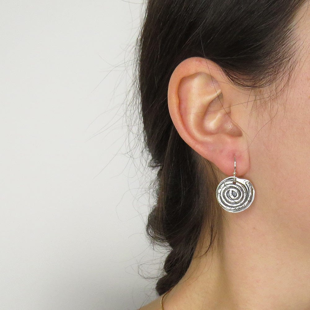 
                      
                        EAR SWIRL AND SWIRL EARRINGS
                      
                    