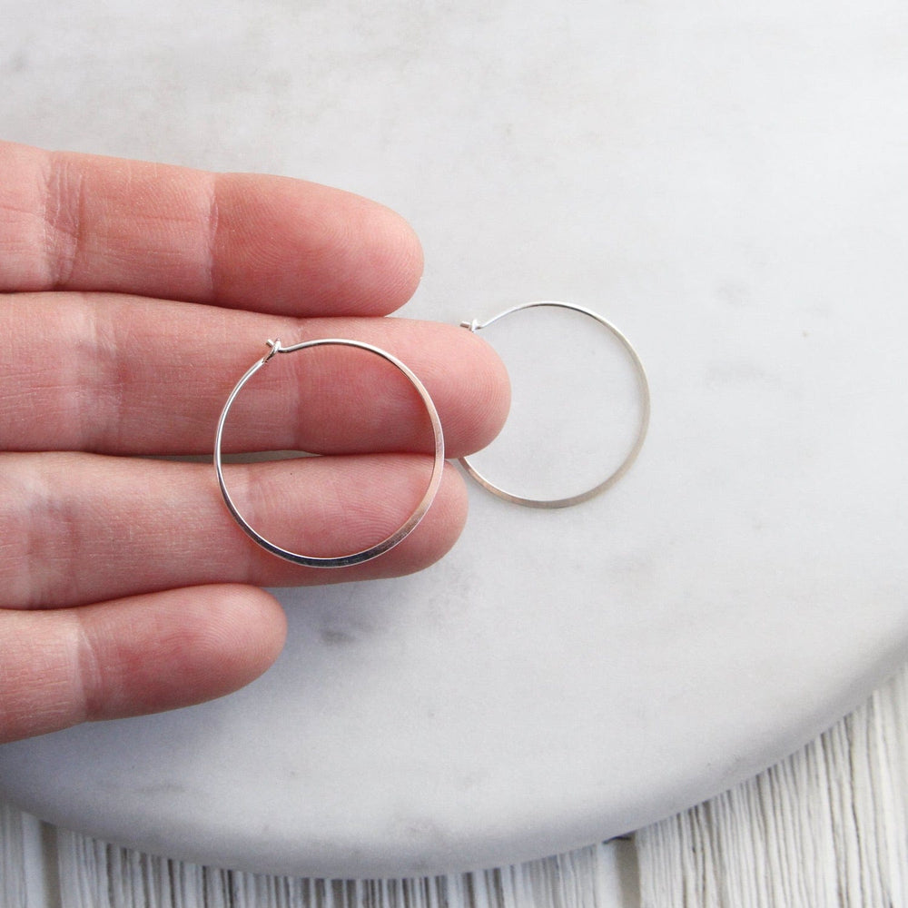 
                  
                    EAR Thin 25mm Sterling Silver Flat Wire Hoop
                  
                