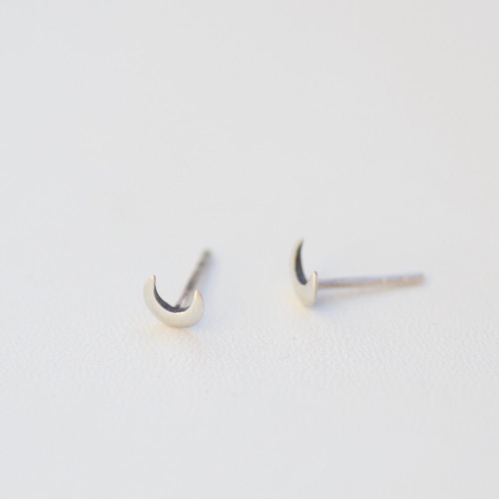 
                      
                        EAR Tiny Crescent Moon Studs - Sterling Silver
                      
                    