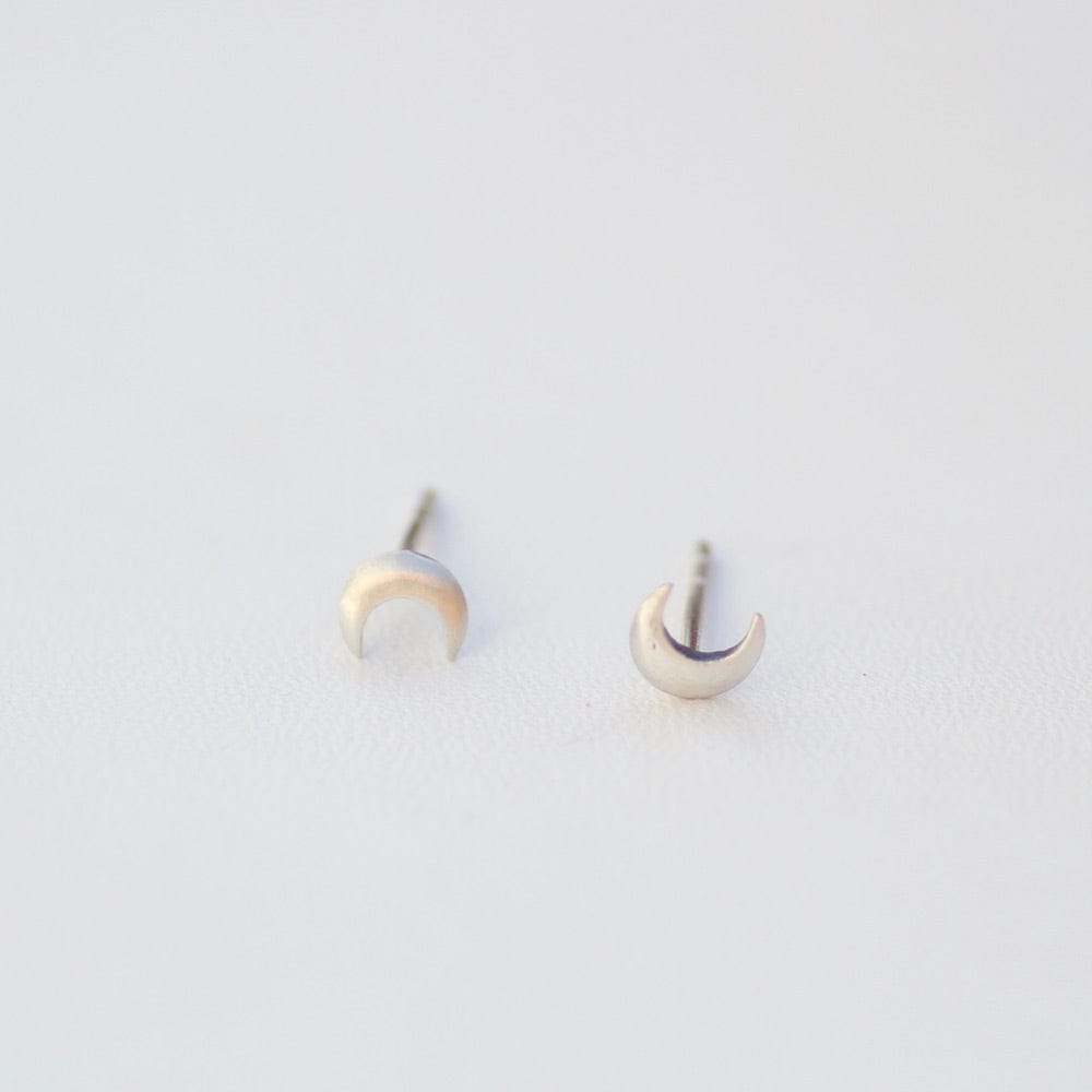 
                      
                        EAR Tiny Crescent Moon Studs - Sterling Silver
                      
                    