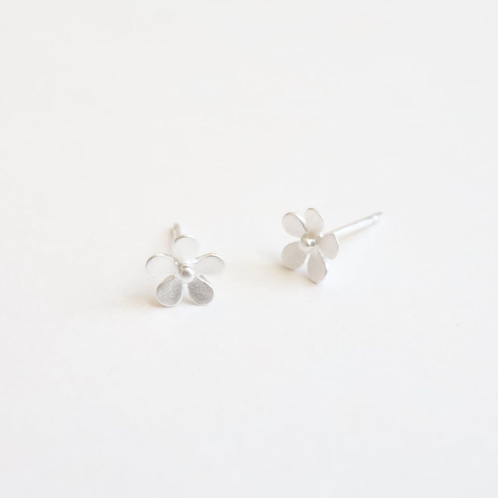 
                  
                    EAR Tiny Flower Stud Earring in Brushed Sterling Silver
                  
                