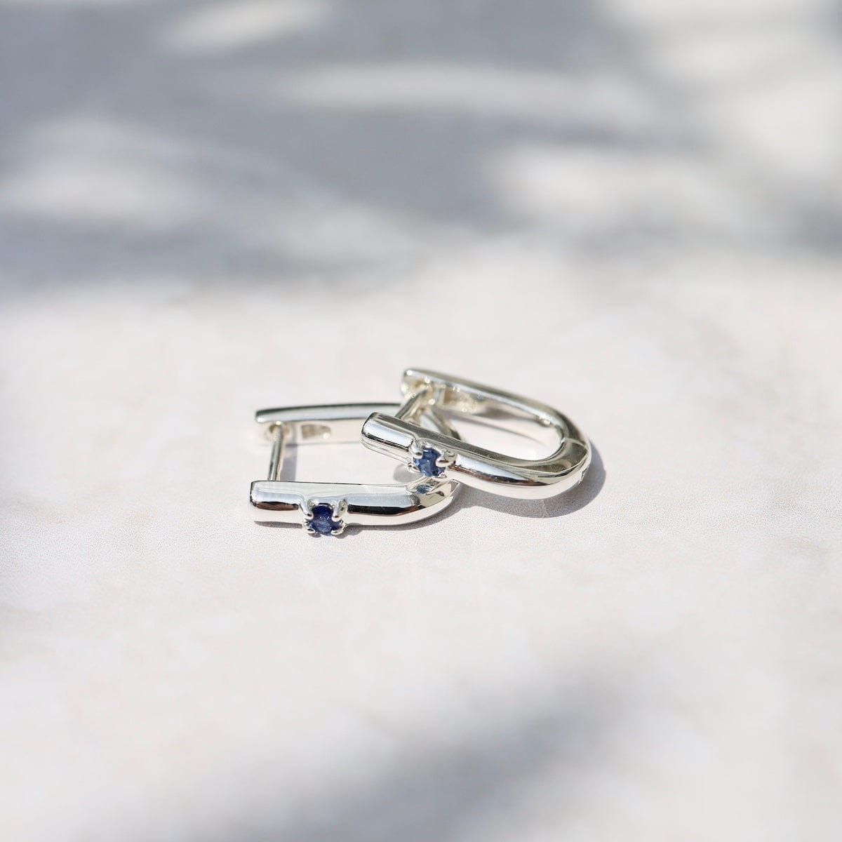 EAR U Shaped Huggie Hoops with Blue Sapphire in Sterling Silver