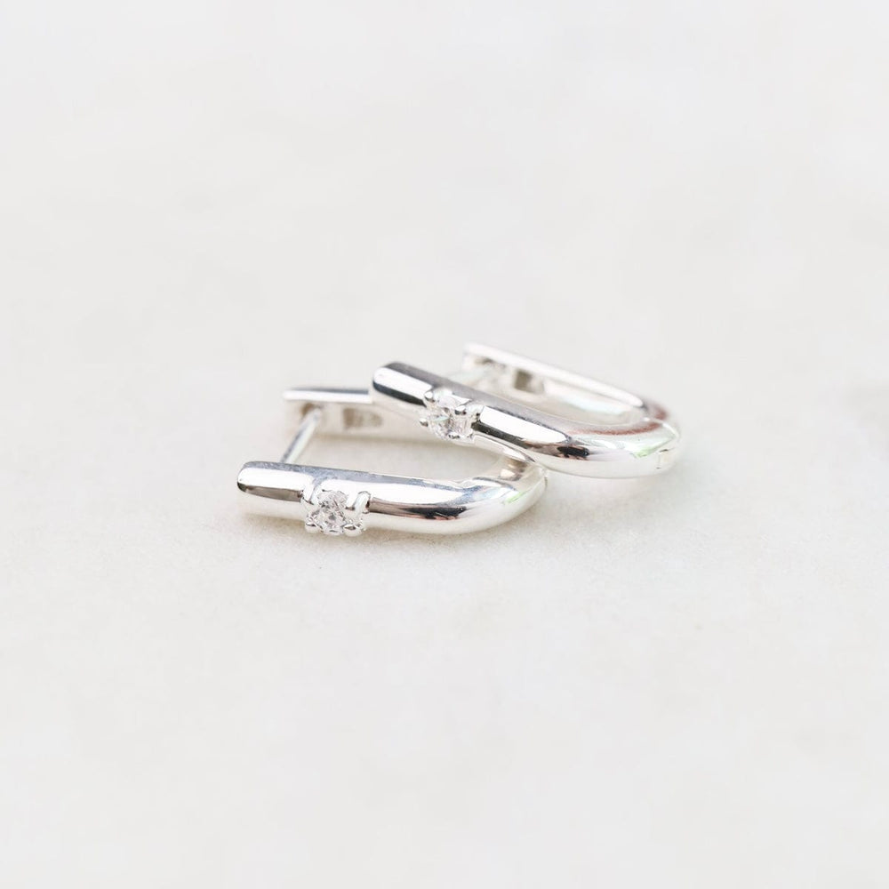 
                      
                        EAR U Shaped Huggie Hoops with CZ in Silver
                      
                    