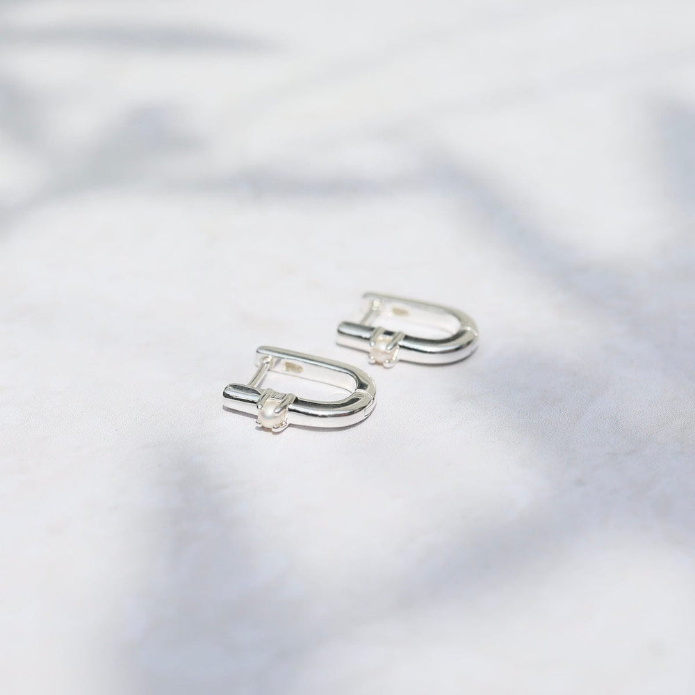 
                      
                        EAR U Shaped Huggie Hoops with Pearls - Sterling Silver
                      
                    