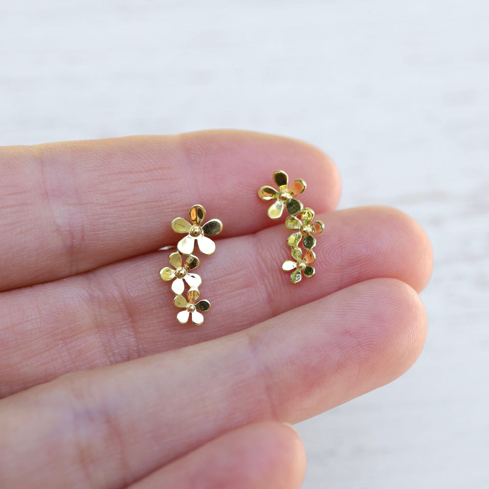 
                  
                    EAR-VRM Gold Vermeil Climbing Curve of Forget-me-not Flowers Studs
                  
                