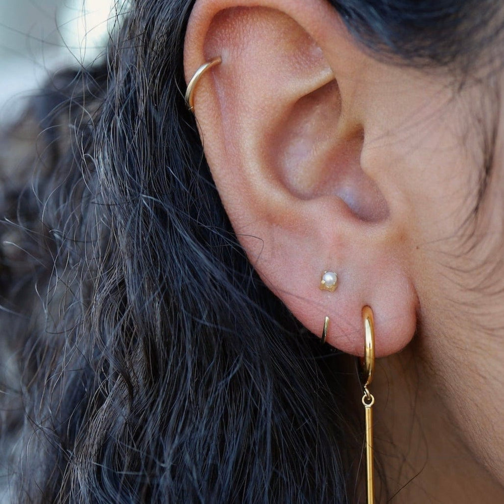 
                      
                        EAR-VRM Gold Vermeil Pearl Huggie Hoops
                      
                    