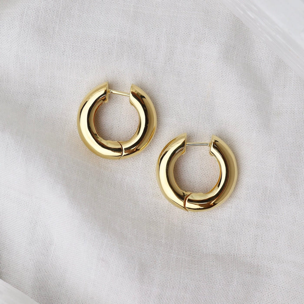 
                      
                        EAR-VRM Super Chunky Doughnut Click Huggie Hoops - Gold Vermeil
                      
                    