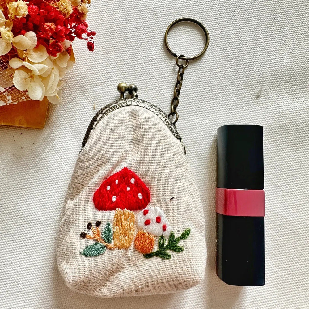 
                      
                        GIFT Beige Embroidered Keychain Pouch - Mushroom Garden
                      
                    