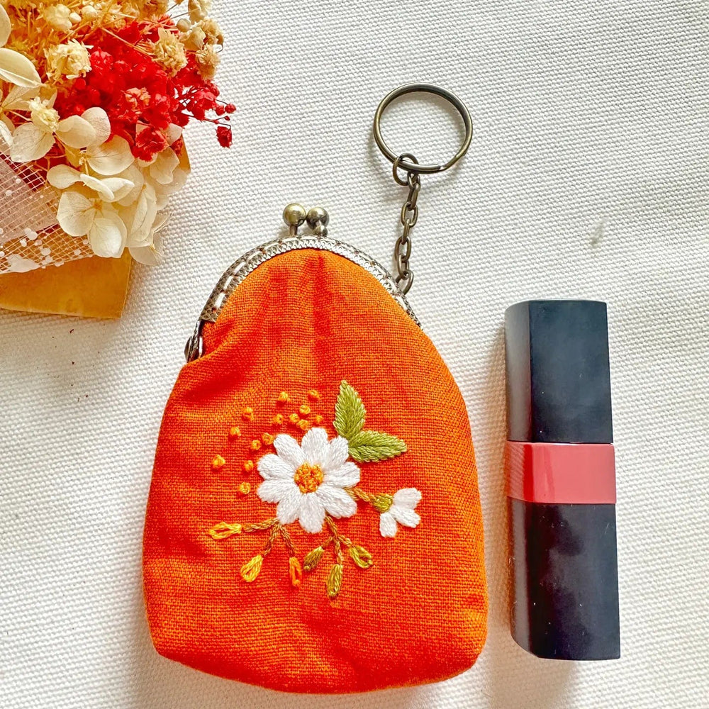 
                      
                        GIFT Orange Embroidered Keychain Pouch - White Daisy
                      
                    