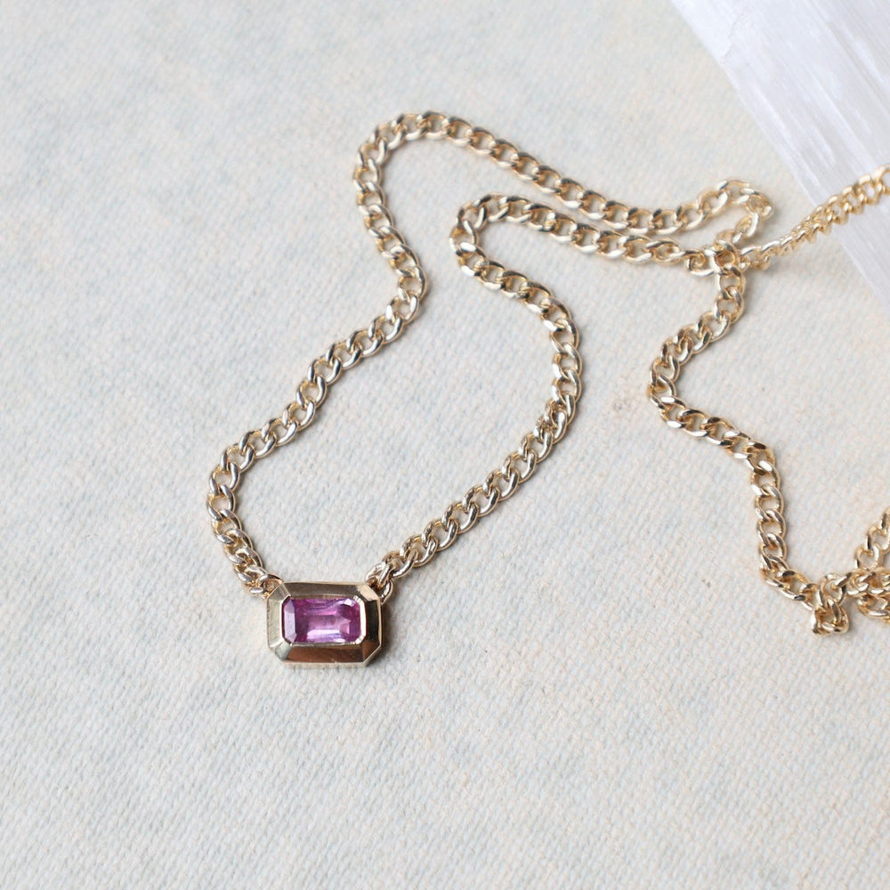 
                      
                        NKL-14K 14k Emerald Cut Pink Sapphire Bezel Curb Chain Necklace
                      
                    