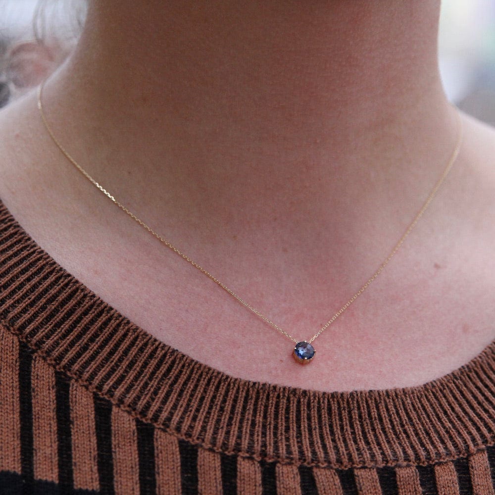 
                  
                    NKL-14K 14k Gold and English Blue Topaz Necklace
                  
                