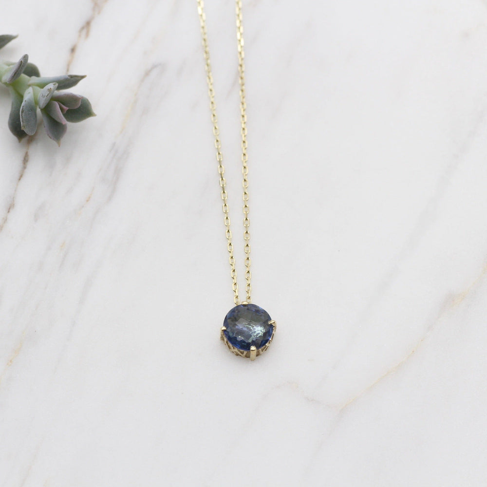 
                  
                    NKL-14K 14k Gold and English Blue Topaz Necklace
                  
                