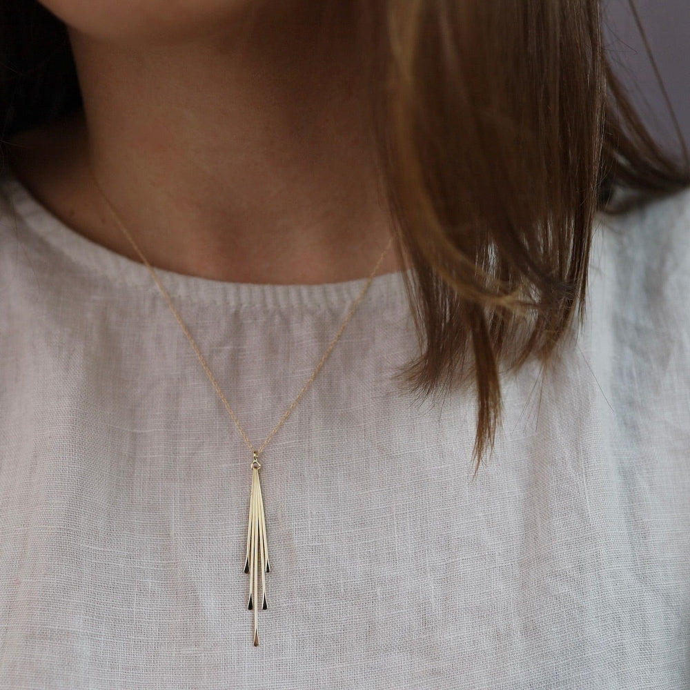 
                      
                        NKL-14K 14k Gold Dangling Sticks Necklace
                      
                    