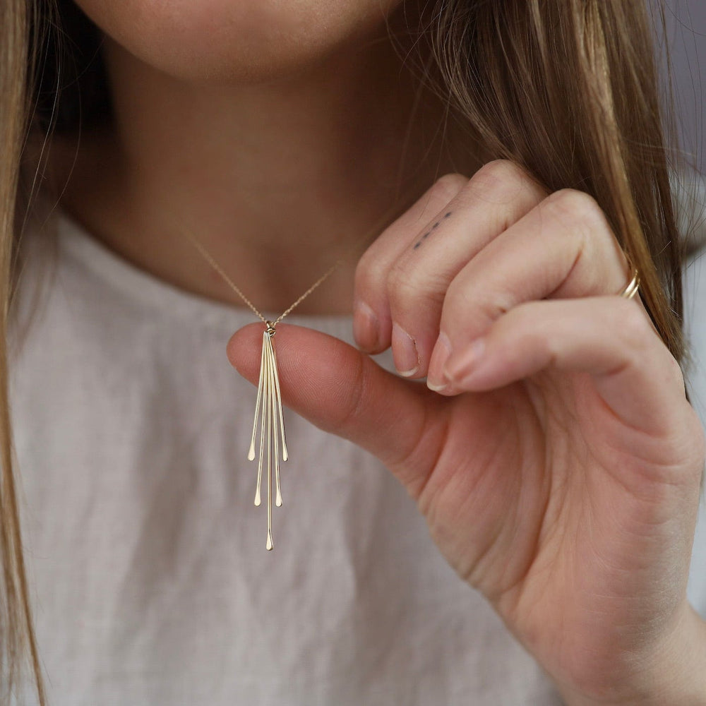 
                      
                        NKL-14K 14k Gold Dangling Sticks Necklace
                      
                    