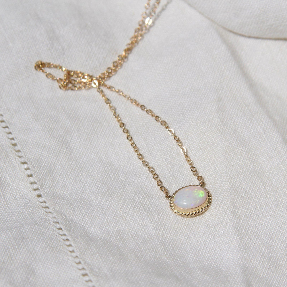 
                      
                        NKL-14K 14k Gold East West Bezel Set Opal Necklace
                      
                    